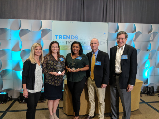 Heather Bramblett, Brandie Bailey, Abronique Berger, and Andy Green accept awards from Michael Rothman PhD, Co-founder and Chief Science Officer for The Rothman Index by Perahealth