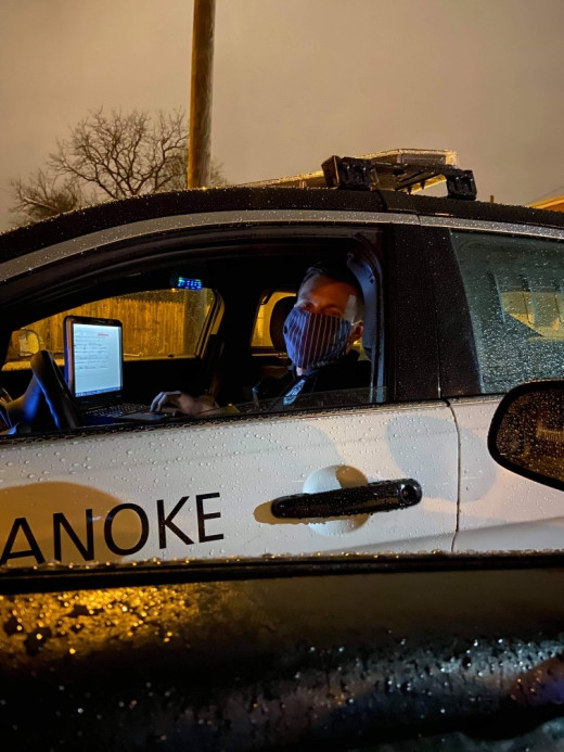 Roanoke City Policeman wearing mask made by Sharon Ingram RN FP Roanoke Salem