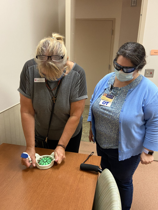 Robin Czar, OTR pictured with her very grateful patient.