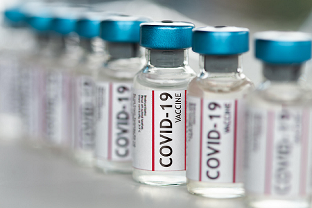 Covid vaccine vials in a line