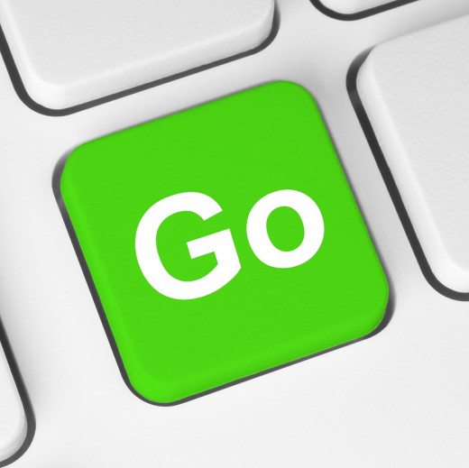 computer key with the word "go" in green