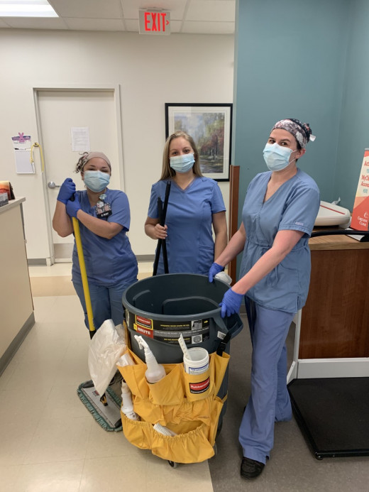 Staff cleaning the clinic