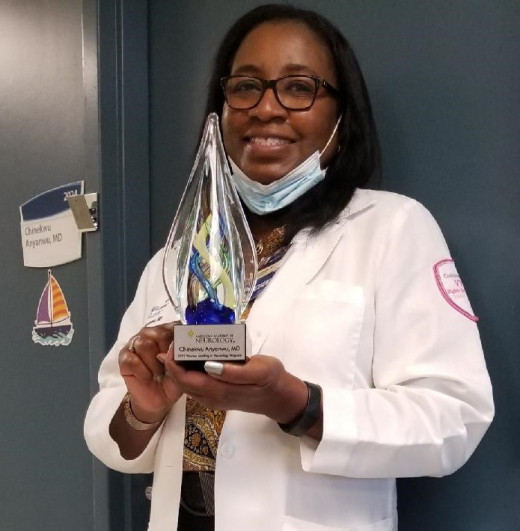 Dr. Anyanwu with AAN Award [Closeup]