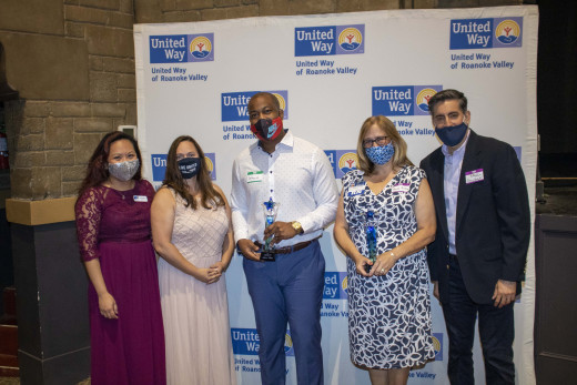 Betty Robertson (4th from the right) accepting the United Way for Roanoke Valley’s Distinguished Service Award