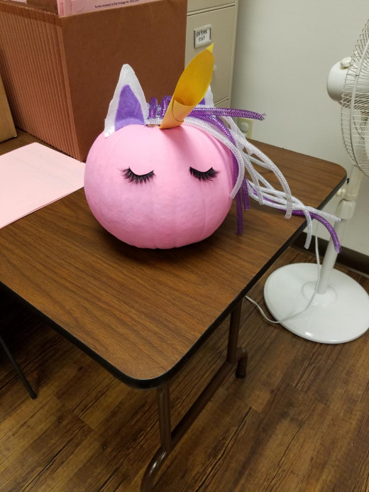Pumpkin art by Brittney Meek, Clinic Manager's daughter Hattie Meek