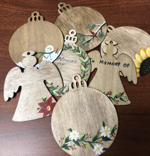 Karen gifted her talent for painting this year to Lights of Love, creating scenes of the season on each ornament hanging on the Lights of Love tree in the CRMH west lobby.