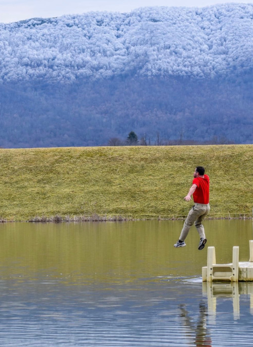 David Vance, Pharmacy Manager taking the plunge at Lincolnshire Lake in Tazewell.  The water was 46 degrees!