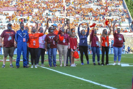 Pregame photo of Carilion employees at the VT-UNC football game.