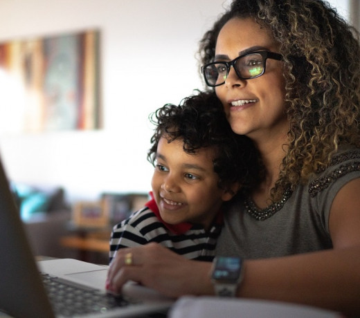 Woman and son at a computer