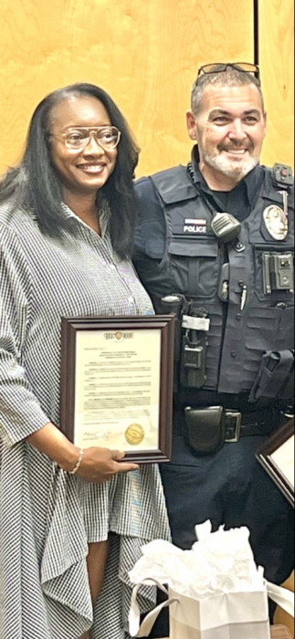 Shannika and the Police Officer she saved