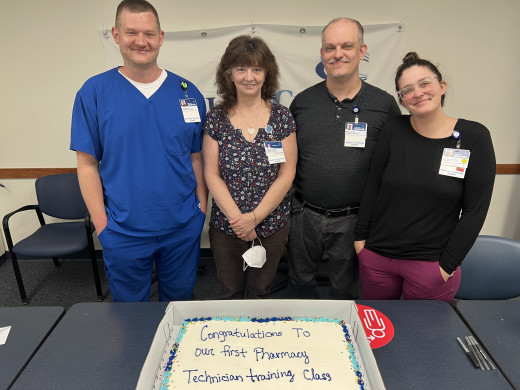 Tech Students Celebrate with Cake