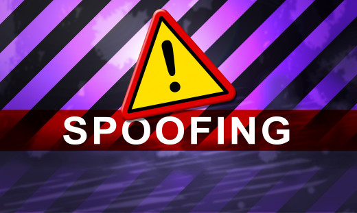 an exclamation point and the word "spoofing"