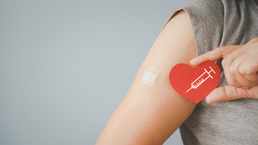 Arm with bandage and heart
