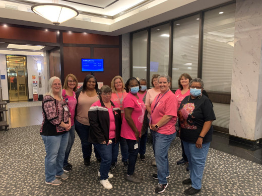 CASB staffers rocking pink attire