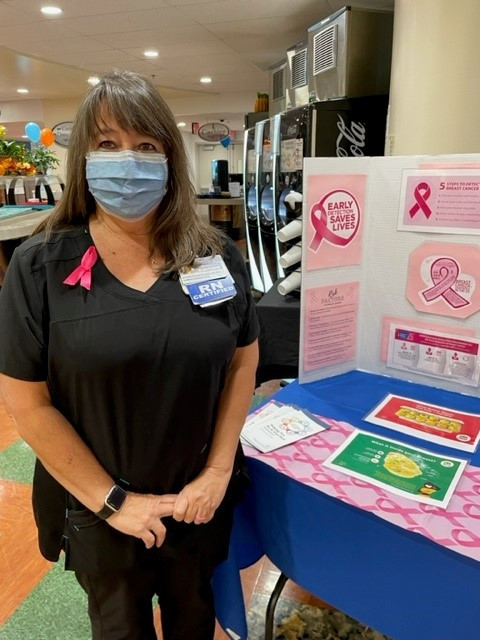 Susan Blankenship at the display at CRMH's Mountain View Cafe