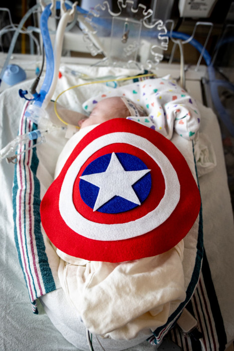 NICU patient dressed up as Captain America for Halloween