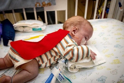 NICU patient dressed up as Flash for Halloween