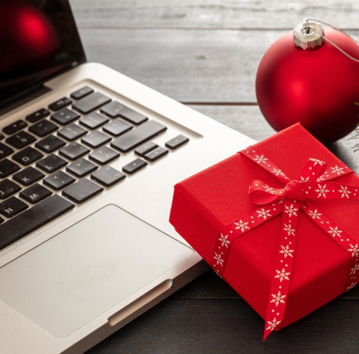 computer next to holiday decorations