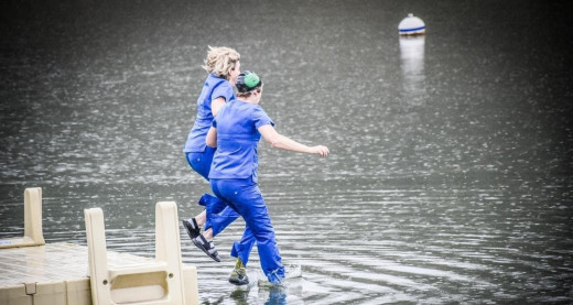 Jenifer Duty and Terri Brewster plunge into Lincolnshire Lake in Tazewell.