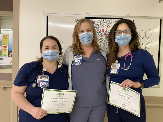 Martha Gibbs and Kate Willis with their Unit Director Katie Hayes
