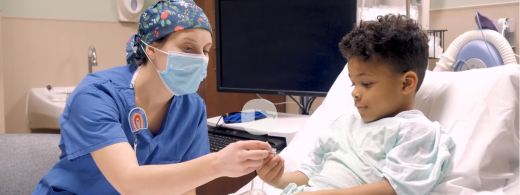 child life specialist working with a child