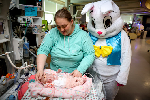 Easter Bunny with NICU patient and parent