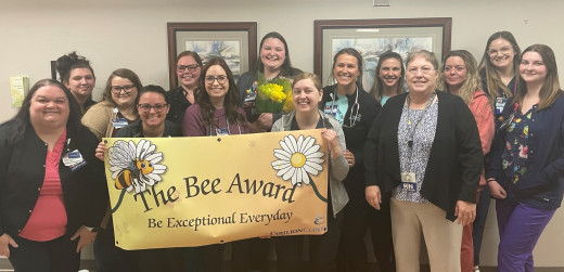 Rachel Goode with 12 South Team Members