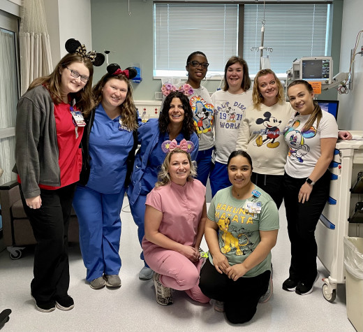 Disney Day. Front: Ashley Graham RN UD, Nargis Noorzad CA. Back (Left to Right): Jessica Wygal CA, Jamie Sievers RN, Deena Cole CA, Jodi-Ann Wilson RN, Kari Mangold RN, Becca Summey RN CTL, Ciara Hicks RN