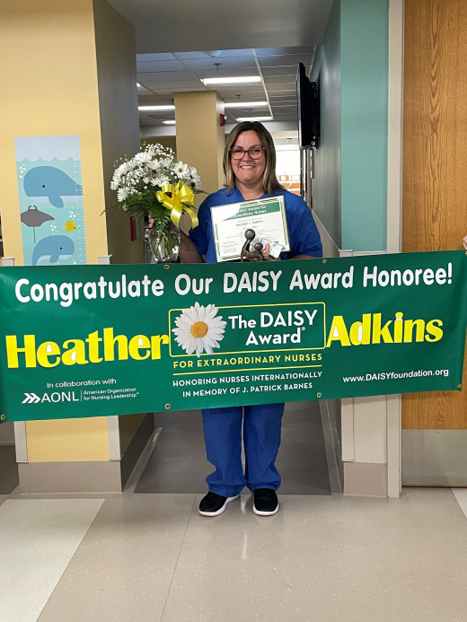 Heather Adkins puts her patients fears at ease by allowing her Mom to stay by her side during her transfusion