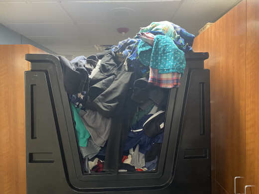 Overflowing clothes bin