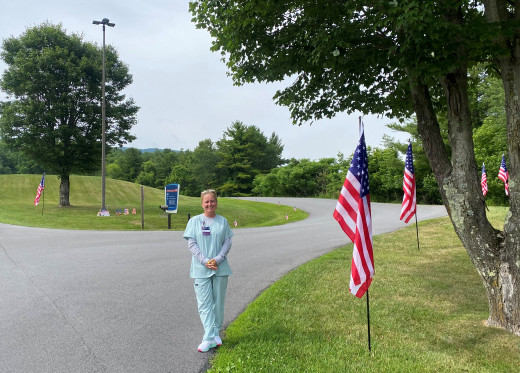 Karen Ray, a nurse in the Veteran's Clinic is pictured at the CTCH campus where she and her husband provided dozens of flags to celebrate Independence Day.  