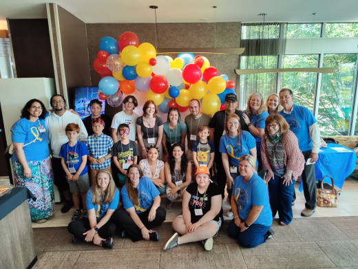 Group of Staff and Oncology Patients Smiling