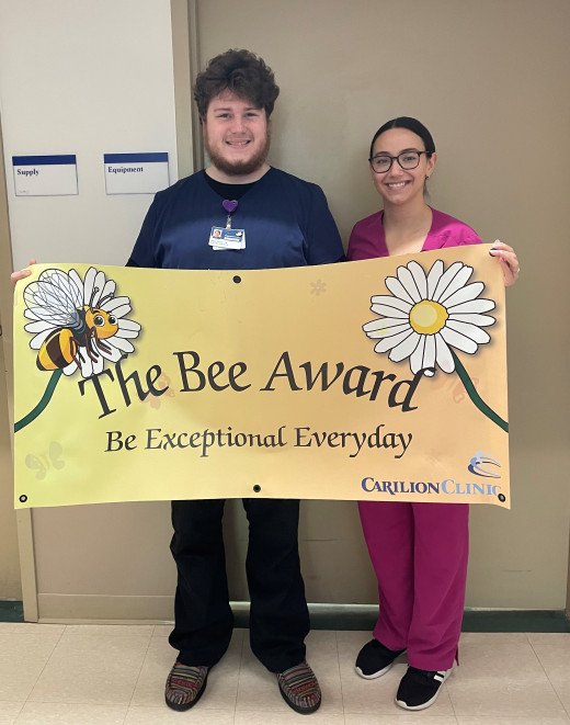 Zane Doss with Carla Bapst, Unit Director, 10 MTN ICU