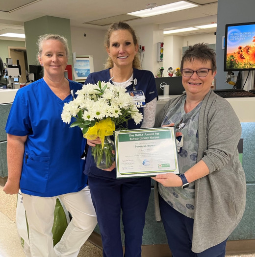 Susan Brown with Katrina Leonard, OM and Nancy Lopresto, Unit Director