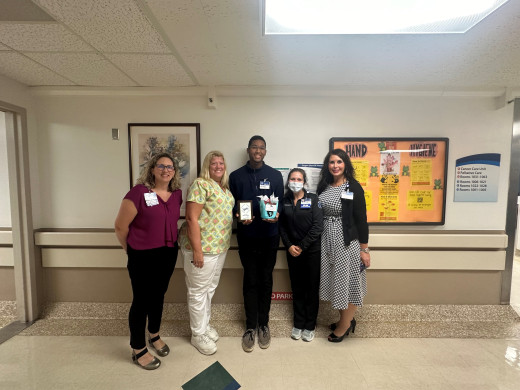 Pictured left to right: Kristin Crouse, Transition to Practice Director; Sherri Chaney, unit operations manager; Brian Francis, PCT; Annie Phillips, 10W unit director; Tami Frost, Chief Nursing Officer