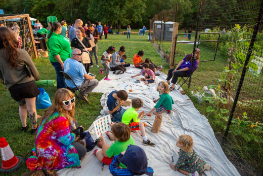 Families enjoy pumpkin painting