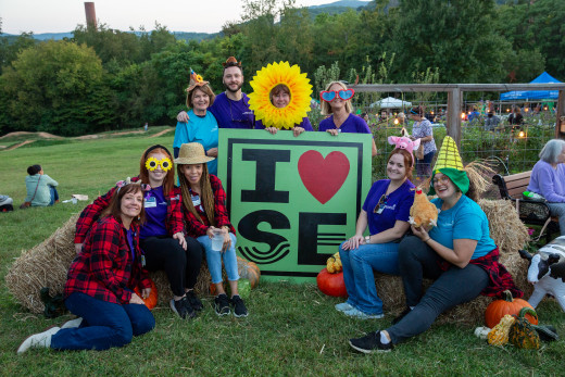 Community Health and Outreach team poses in the I Heart SE photo booth