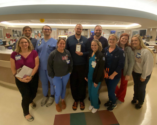 Riley Jensen with members of the 8MICU team 