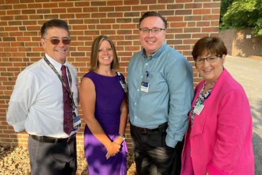  Lisa Hebert-Meritt (2nd from left ) with Carilion Clinic Home Care Administration team (from left to right): Dr. Brian Unwin (geriatric specialist), Virgil Thompson (Rehab Director for Carilion Clinic Home Care), and Lisa Sprinkle (Carilion Clinic VP Hospital Operations/CBS Administration)