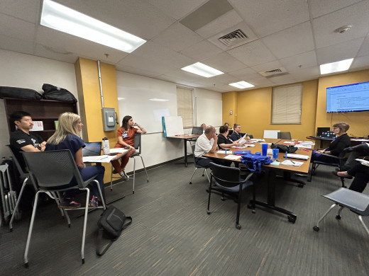 Teams holding a discussing about their role in a crisis response event at the mental health facility.