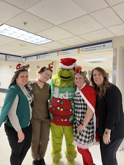 Catie Rhodes, Jessica Wygal, The Grinch, Ashley Graham, Lori Peggins