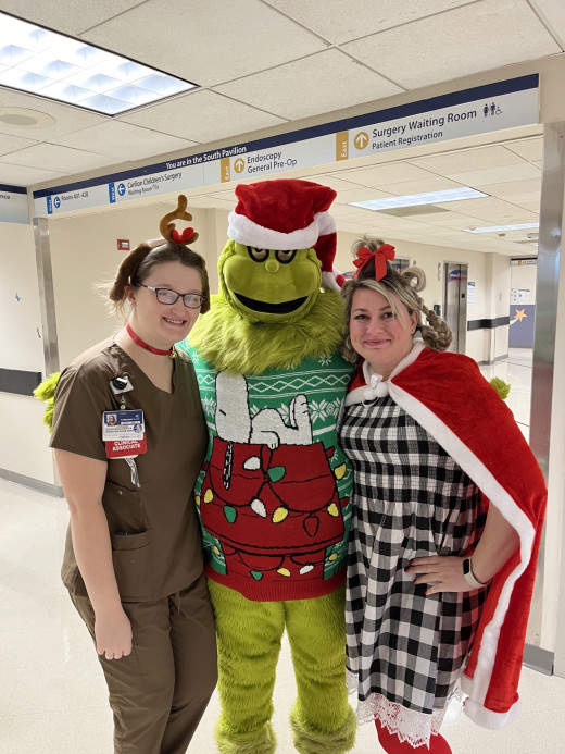 Jessica Wygal as Max, The Grinch, Ashley Graham as Cindy Lou Who 