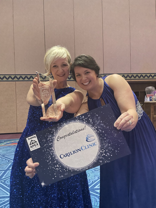 Sarah Racz and Jamie Landes-Hypes representing Carilion Clinic at the Training Magazine Apex Awards