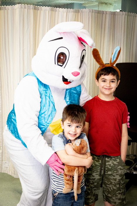 Easter bunny visits with pediatric patients