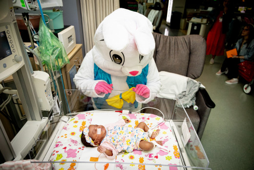 Easter bunny visits with pediatric patients