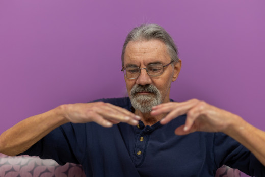 Joe Santos shows essential tremor prior to the focused ultrasound treatment.