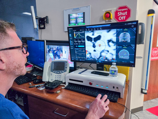 Dr. Witcher reviews the MRI scan.