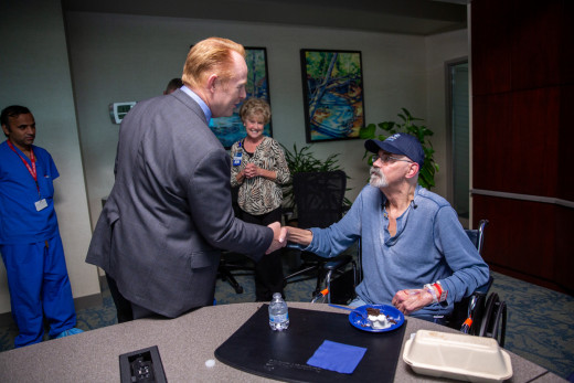 Steve Arner congratulates Joe on the successful treatment.
