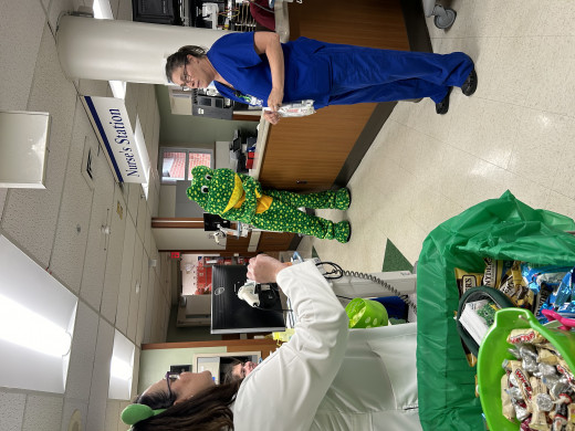 Franklin visits with Acute Care staff.