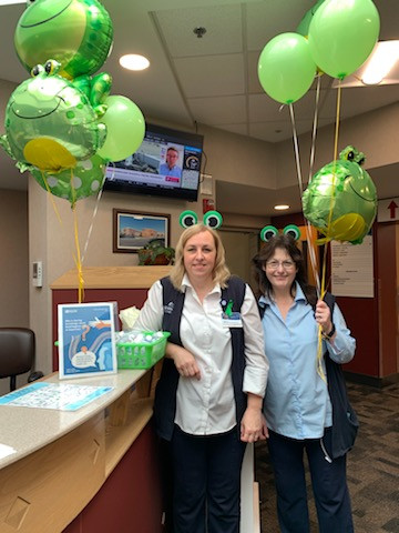 Franklin visits with CFMH Guest Services.